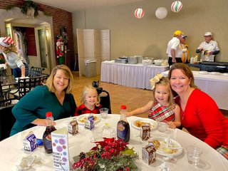 2021 Dec - Breakfast with Santa 3 - family at table.jpg