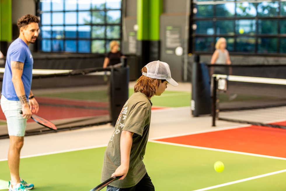 ChickenNPickleKids playing indoor pickleball.jpg