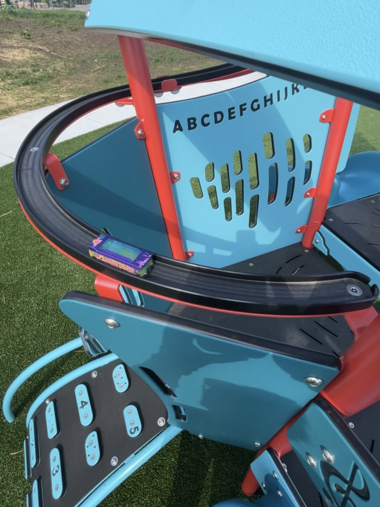 New Emerald Ridge Park in Smithville, MO has a race car track for kids to enjoy on the playground